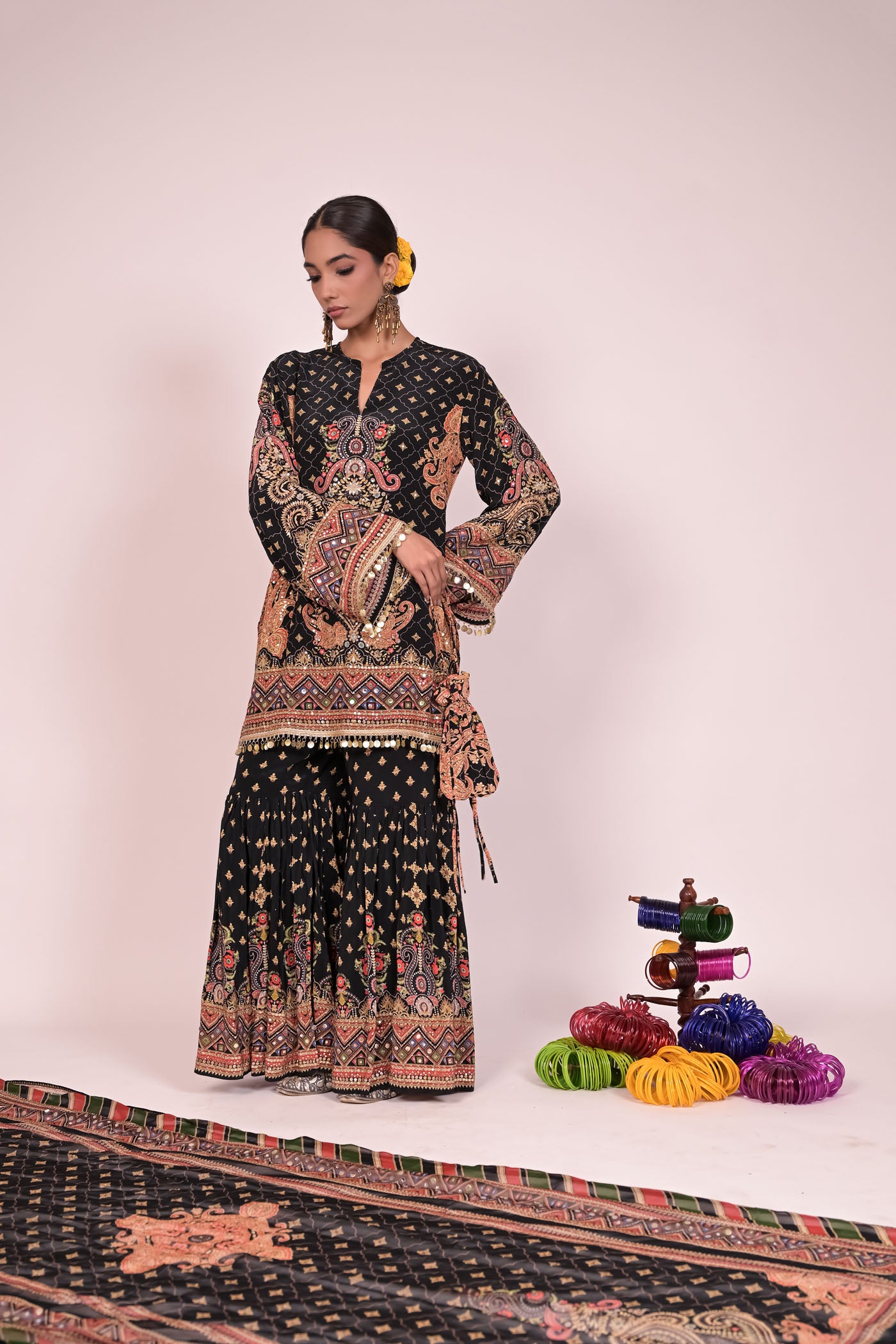 Short black kurti with sharara and printed dupatta