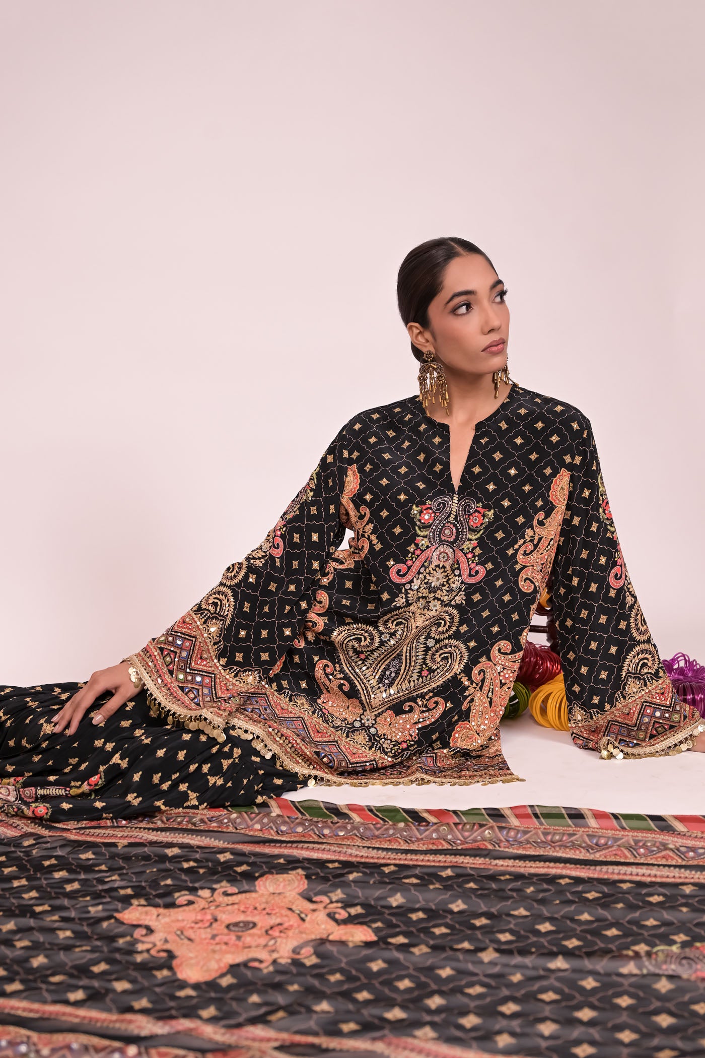 Short black kurti with sharara and printed dupatta