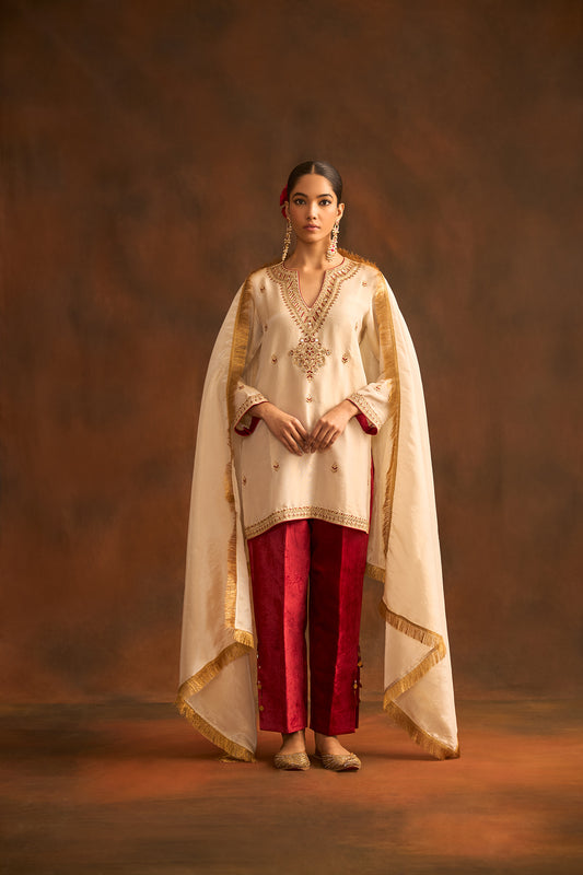 Prana gold tissue with straight  cut pants with slits