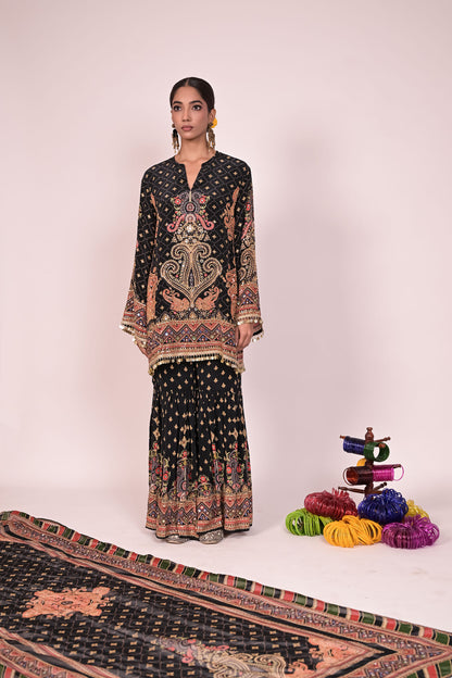 Short black kurti with sharara and printed dupatta