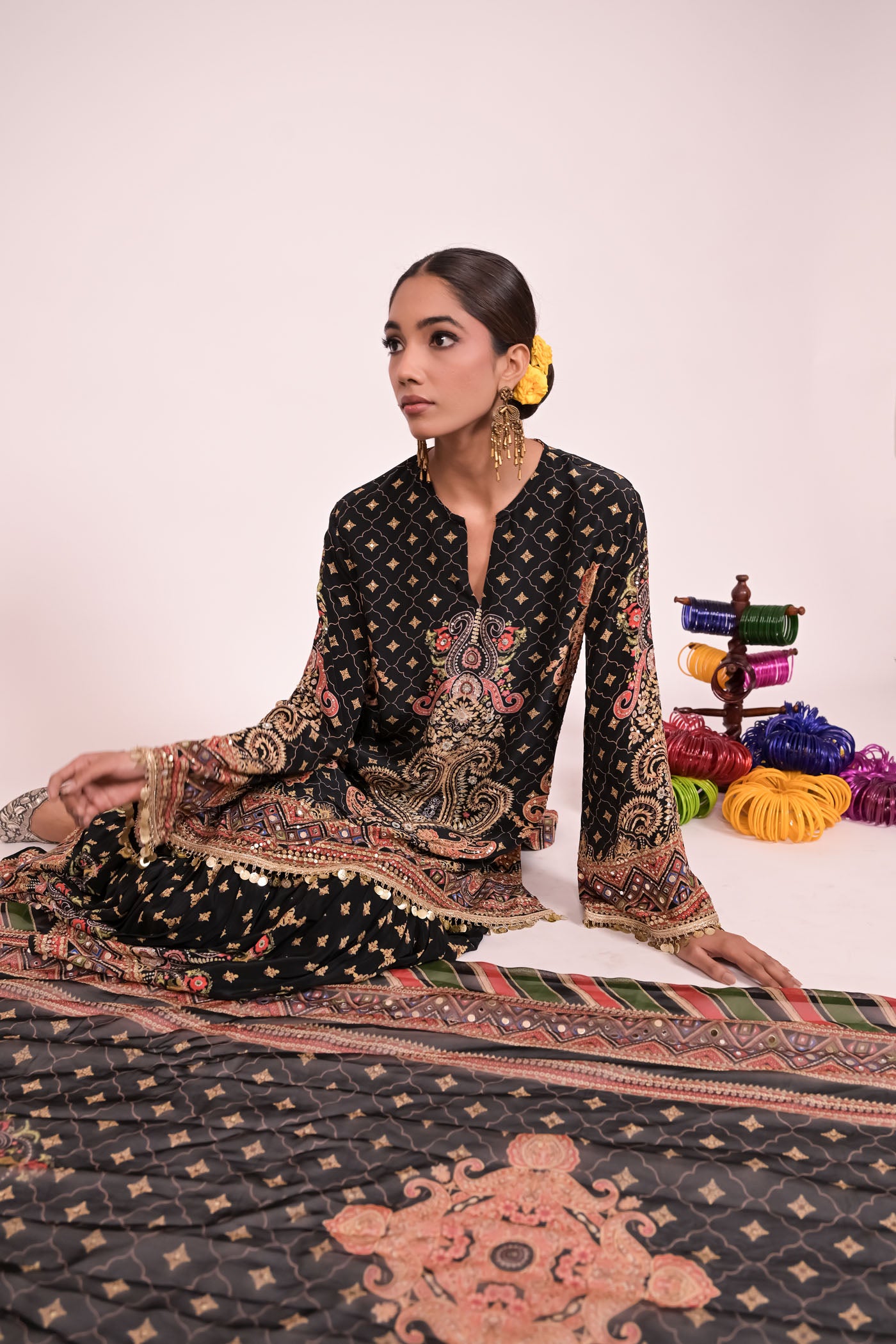 Short black kurti with sharara and printed dupatta