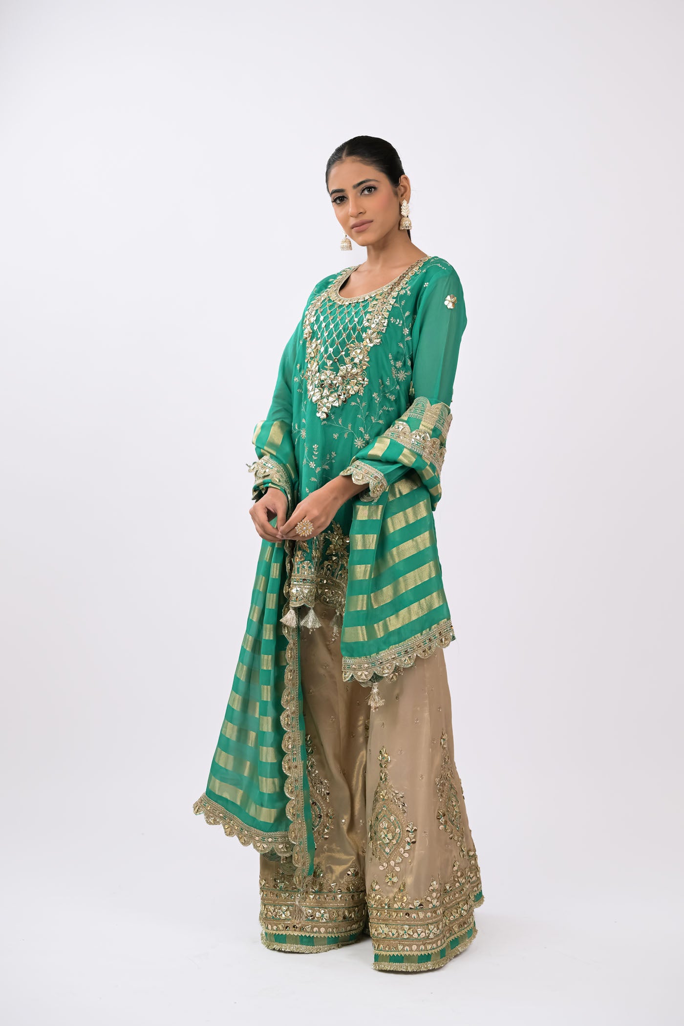 Zariya Embellished teal green Kurta Set