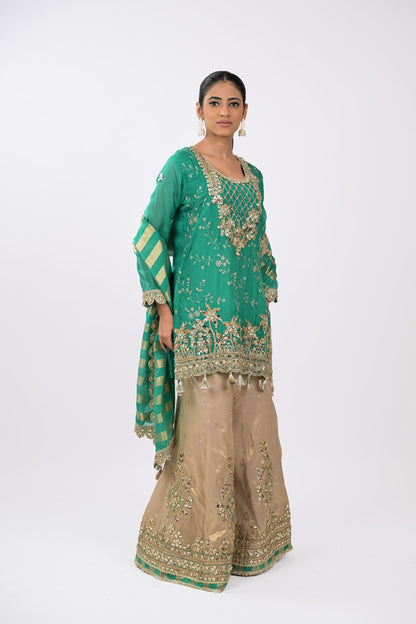 Zariya Embellished teal green Kurta Set