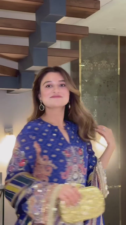 Short blue kurti with sharara and printed dupatta